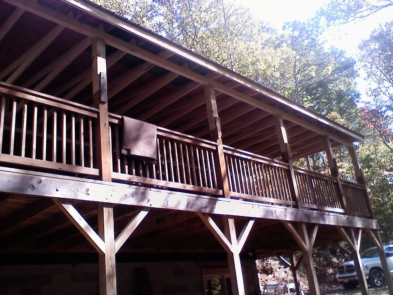 Timber framing under a new elevated porch and deck — Roof Leak Repair in Pleasant Grove by Roofing Brothers